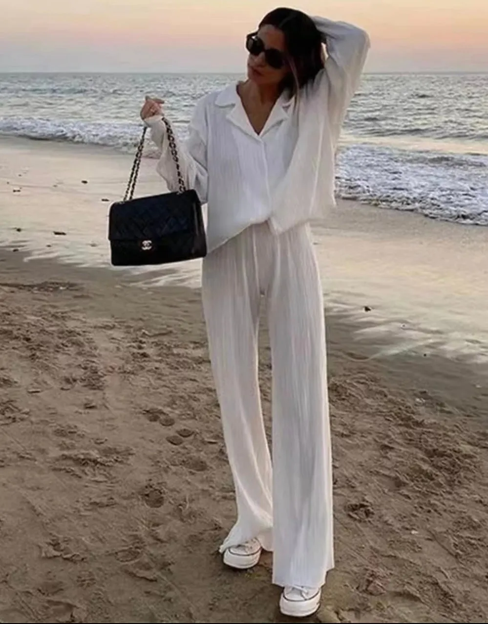 WHITE PLEATED TROUSERS